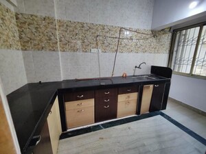 Kitchen in 2 BHK Apartment at Vishwakarma Tower, Kharghar – for Sale