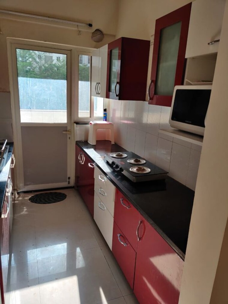Kitchen, snn-raj-serenity 3.5 Bedroom 2200 Sq.Ft. Apartment In Begur Road Bangalore 10383864