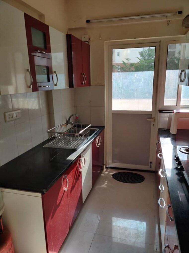 Kitchen, snn-raj-serenity 3.5 Bedroom 2200 Sq.Ft. Apartment In Begur Road Bangalore 10383864