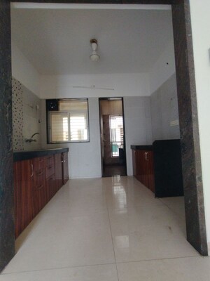 Kitchen in 2 BHK Apartment at Dhangauri Apartment, Dahanukar Colony – for Rent