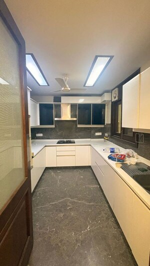 Kitchen in 4 BHK Builder Floor at Friends Colony – for Rent