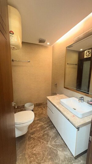 Bathroom in 4 BHK Builder Floor at Friends Colony – for Rent