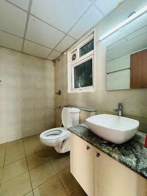 Bathroom in 3 BHK Apartment at Bhartiya Nikoo Homes Phase 2, Thanisandra Main Road – for Rent