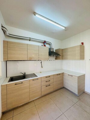 Kitchen in 3 BHK Apartment at Bhartiya Nikoo Homes Phase 2, Thanisandra Main Road – for Rent