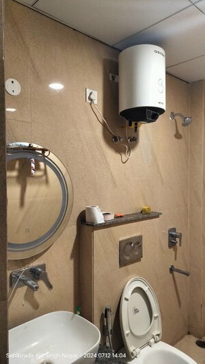 Bathroom in 3 BHK Apartment at Affinity Greens, International Airport Road – for Rent