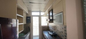 Kitchen in 3 BHK Apartment at Surya Aastha Greens, Sector 4 Greater Noida – for Rent
