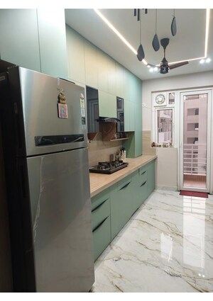 Kitchen in 3 BHK Apartment at Tulsiani Urban Woods, Sushant Golf City – for Rent