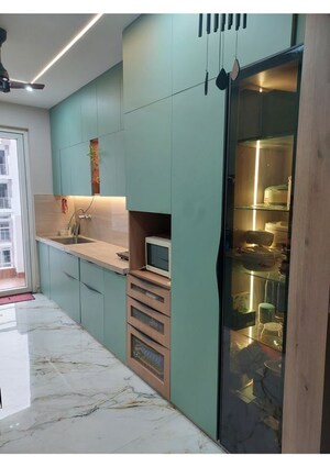 Kitchen in 3 BHK Apartment at Tulsiani Urban Woods, Sushant Golf City – for Rent