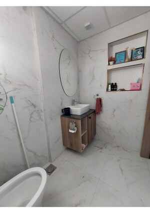 Bathroom in 3 BHK Apartment at Tulsiani Urban Woods, Sushant Golf City – for Rent