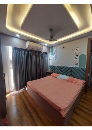Bedroom in 3 BHK Apartment at Tulsiani Urban Woods, Sushant Golf City – for Rent