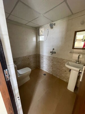 Bathroom in 2 BHK Apartment at Javin Raj Empire, Raj Nagar Extension – for Rent