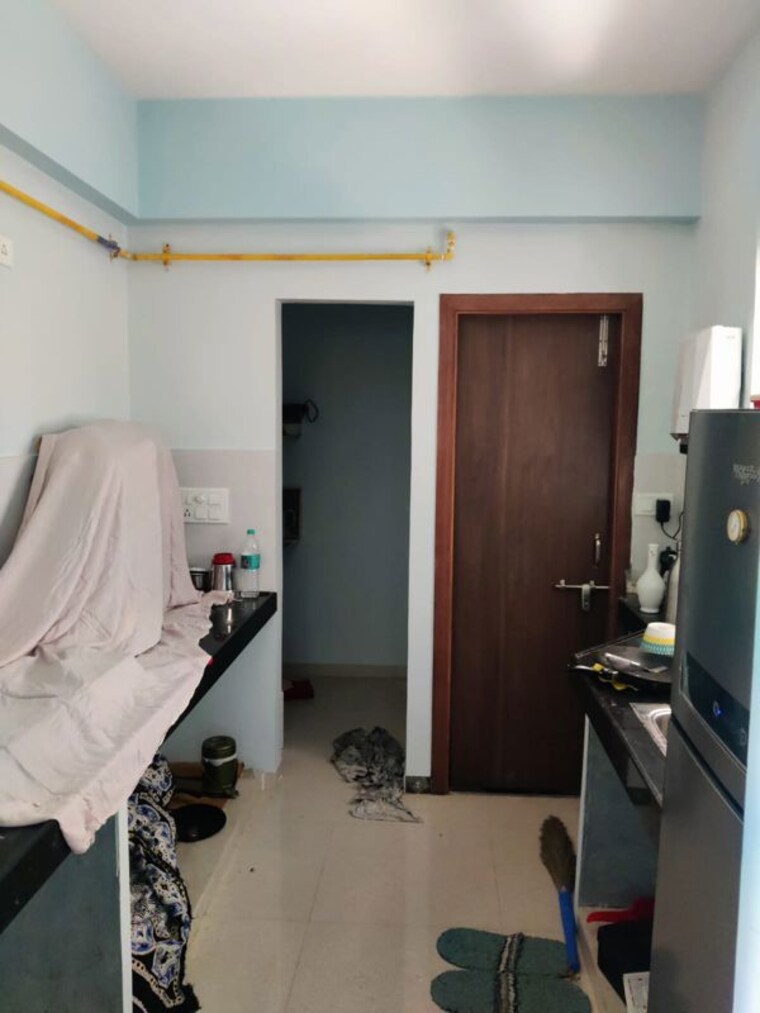 Kitchen, adani-elysium 2 Bedroom 730 Sq.Ft. Apartment In Near Vaishno Devi Circle On Sg Highway Ahmedabad 10384180
