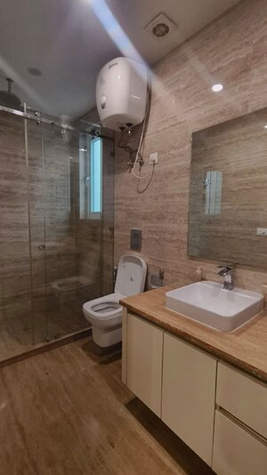Bathroom in 4 BHK Builder Floor at Green Park Extension – for Rent