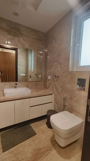 Bathroom in 4 BHK Builder Floor at Green Park Extension – for Rent