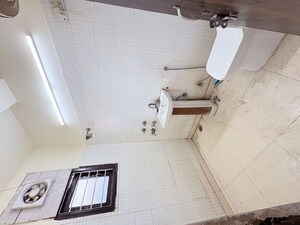 Bathroom in 1 BHK Builder Floor at Khirki Extension – for Rent