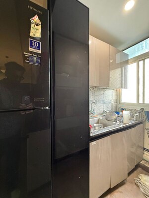 Kitchen in 3 BHK Apartment at Amrapali Kingswood, Sector 4 Greater Noida – for Rent