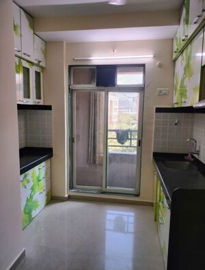 Kitchen in 1 BHK Apartment at Damji Shamji Mahavir Kalpavruksha Wing J Phase 2, Thane West – for Rent