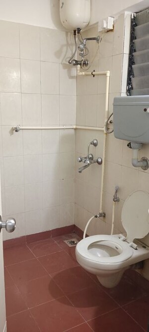 Bathroom in 2 BHK Apartment at Montreal Tower, Andheri West – for Rent