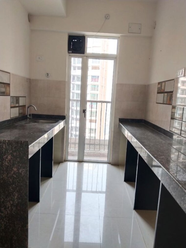 Kitchen, marathon-nexzone-antilia 2 Bedroom 975 Sq.Ft. Apartment In New Panvel Navi Mumbai 10384591