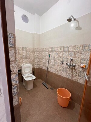 Bathroom in 1.5 BHK Penthouse at Durgakund – for Rent