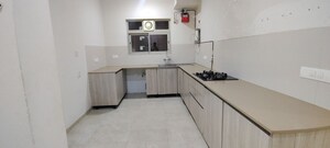 Kitchen in 3 BHK Apartment at Hiranandani Estate Rodas Enclave, Ghodbunder Road – for Sale
