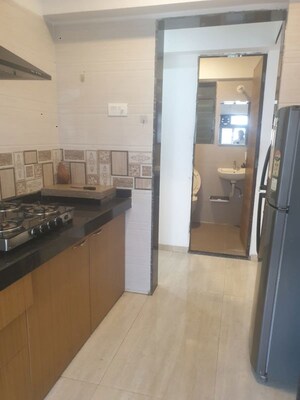Kitchen in 2 BHK Apartment at Je and Vee Vrindavan, Malad East – for Rent