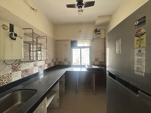 Kitchen in 2 BHK Apartment at Vihang Valley Phase 2, Kasarvadavali – for Sale