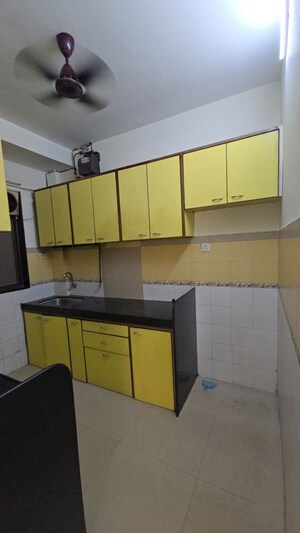 Kitchen in 2 BHK Apartment at Neelsiddhi Residency, Sector 11 Kopar Khairane – for Rent