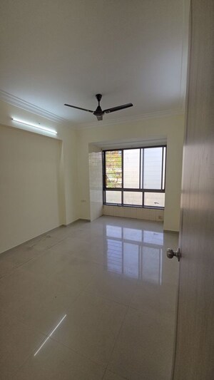 Room in 2 BHK Apartment at Neelsiddhi Residency, Sector 11 Kopar Khairane – for Rent