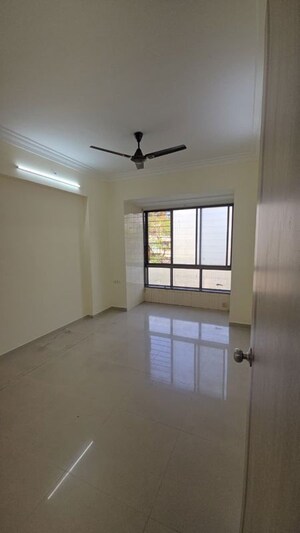Room in 2 BHK Apartment at Neelsiddhi Residency, Sector 11 Kopar Khairane – for Rent