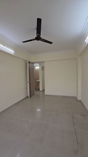 Room in 2 BHK Apartment at Neelsiddhi Residency, Sector 11 Kopar Khairane – for Rent