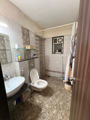 Bathroom in 3 BHK Apartment at Brahma Realty Skycity, Dhanori – for Rent