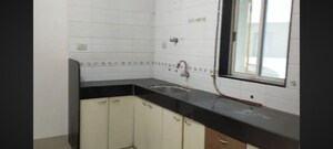 Kitchen in 2 BHK Apartment at Vraj Green Valley, Kolshet Industrial Area – for Rent