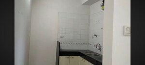 Kitchen in 2 BHK Apartment at Vraj Green Valley, Kolshet Industrial Area – for Rent