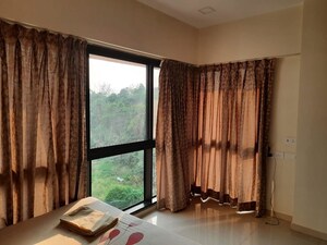Living Room in 2 BHK Apartment at Kanakia Rainforest, Andheri East – for Rent