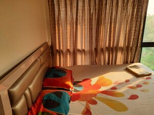 Bedroom in 2 BHK Apartment at Kanakia Rainforest, Andheri East – for Rent