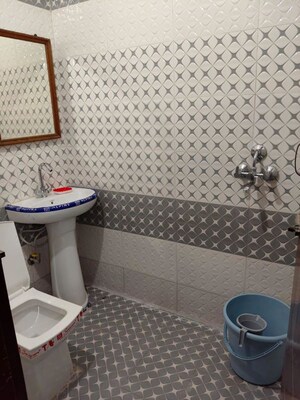 Bathroom in 3 BHK Builder Floor at Guru Nanak Enclave, Dhakoli – for Rent