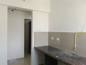 Kitchen in 1 BHK Apartment at Puranik City Reserva, Ghodbunder Road – for Rent