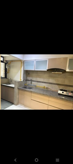 Kitchen in 3 BHK Apartment at Shivalik Sharda Park View, Shela – for Rent