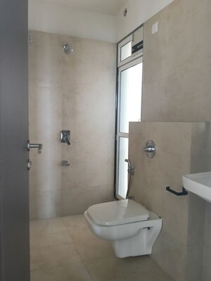 Bathroom in 1 BHK Apartment at Puranik City Reserva, Ghodbunder Road – for Rent