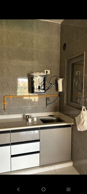 Kitchen in 3 BHK Apartment at Sun Optima, Ghuma – for Rent