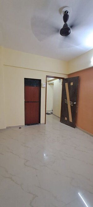 Room in 2 BHK Apartment at Pranjee Garden City, Katrap – for Rent