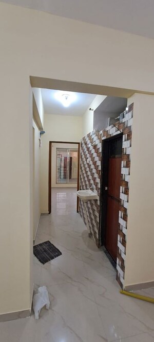 Staircase in 2 BHK Apartment at Pranjee Garden City, Katrap – for Rent