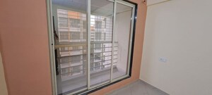 Room in 2 BHK Apartment at Pranjee Garden City, Katrap – for Rent