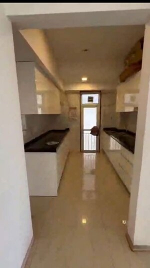 Kitchen in 3 BHK Apartment at Ruparel Ariana, Parel – for Rent