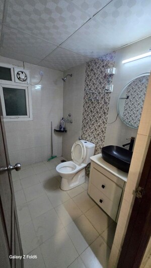 Bathroom in 4 BHK Apartment at Saviour Park, Mohan Nagar – for Sale