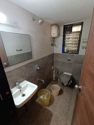 Bathroom in 2 BHK Apartment at Ankur Building, Malad West – for Rent