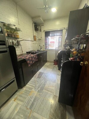 Kitchen in 2 BHK Apartment at JPV Pratap Liberty One, Malad West – for Rent