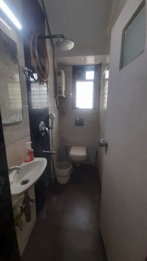 Bathroom in 2 BHK Apartment at JPV Pratap Liberty One, Malad West – for Rent