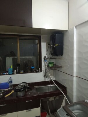 Kitchen in 2 BHK Apartment at Maa Enrich, Malad East – for Sale
